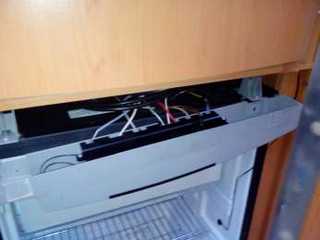 réparation porte frigo dométique